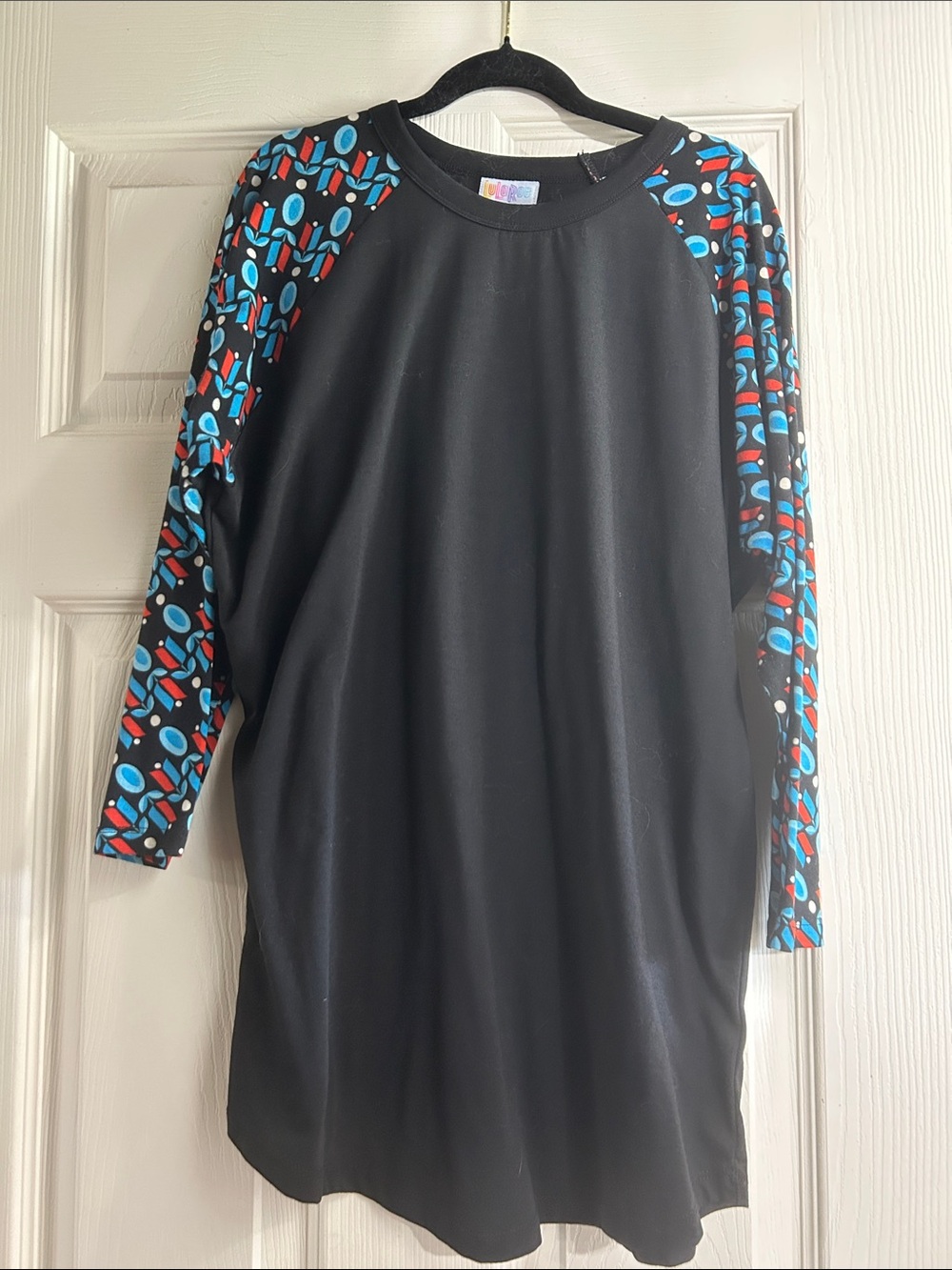 LuLaRoe Kids Black Raglan Top with Blue and Red Patterned Sleeves